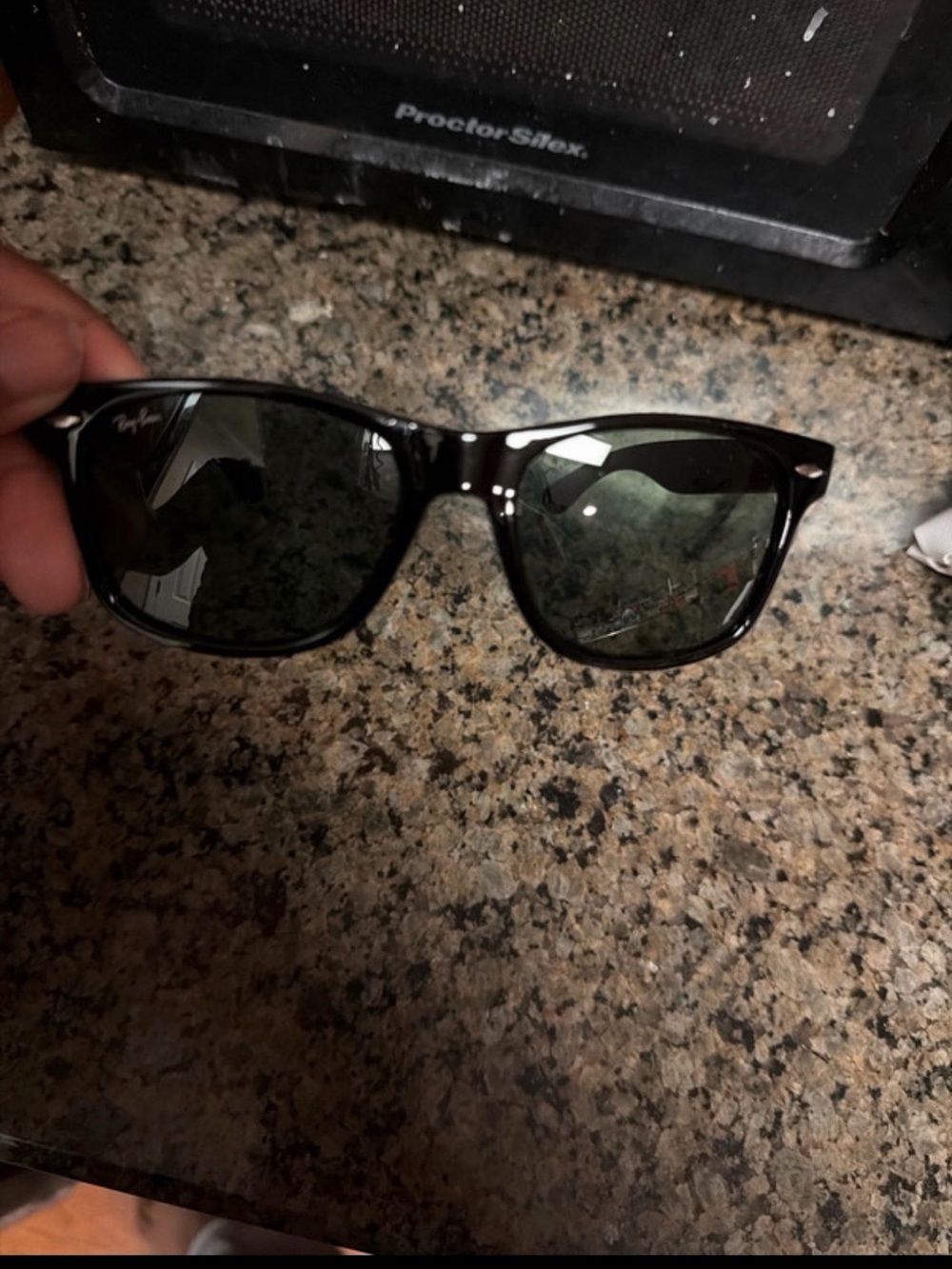 Ray-Ban Black Frame Sunglasses with Dark Green Lenses